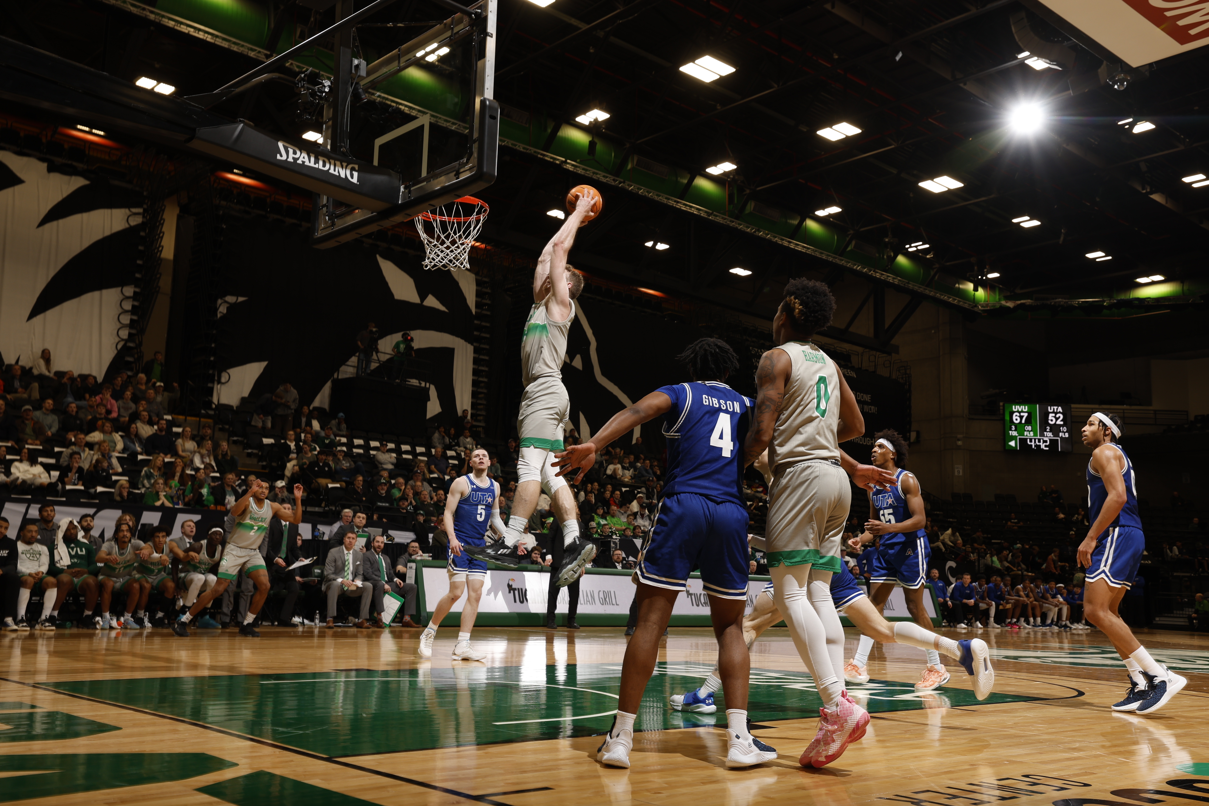 Utah Valley forward Tim Fuller dunks against UT Arlington, Wednesday, March 1, 2023 at the UCCU Center in Orem.
