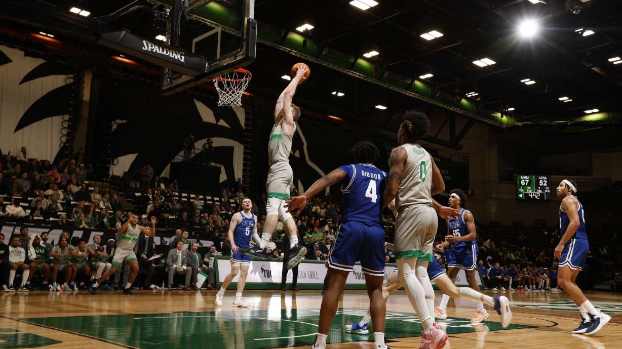 Utah Valley forward Tim Fuller dunks against UT Arlington, Wednesday, March 1, 2023 at the UCCU Center in Orem.