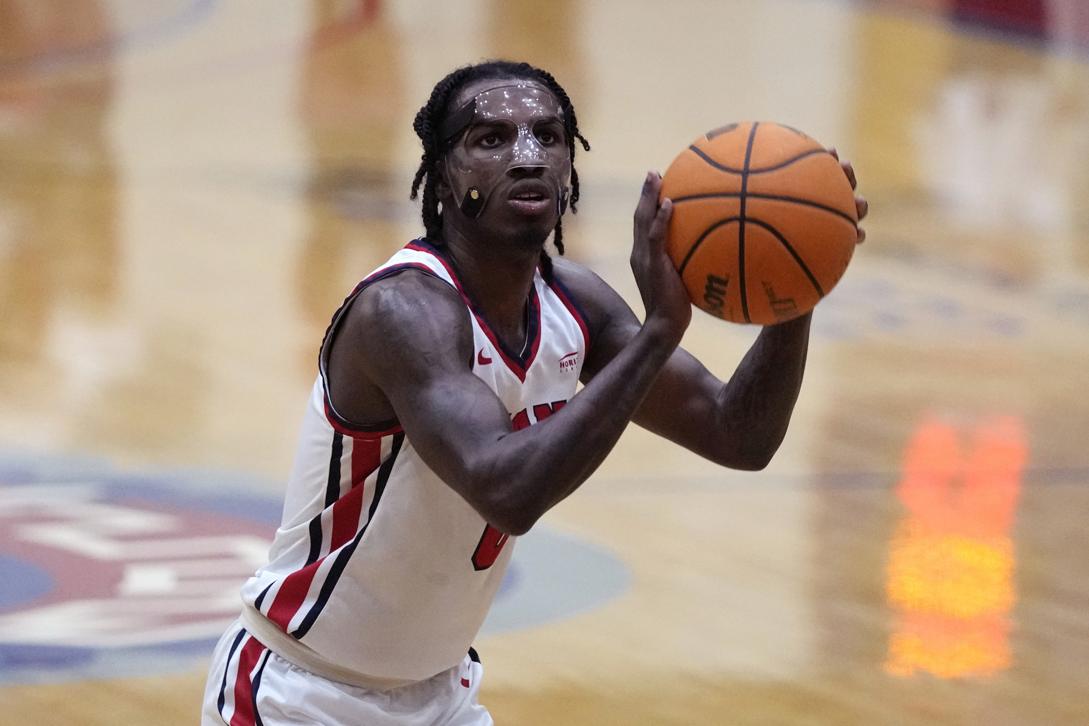 FILE - Detroit Mercy guard Antoine Davis shoots a free-throw during an NCAA college basketball game against Youngstown State, Thursday, Jan. 12, 2023, in Detroit. The Detroit Mercy's star guard needs just 26 points to surpass Pete Maravich as the NCAA's career scoring leader. 
