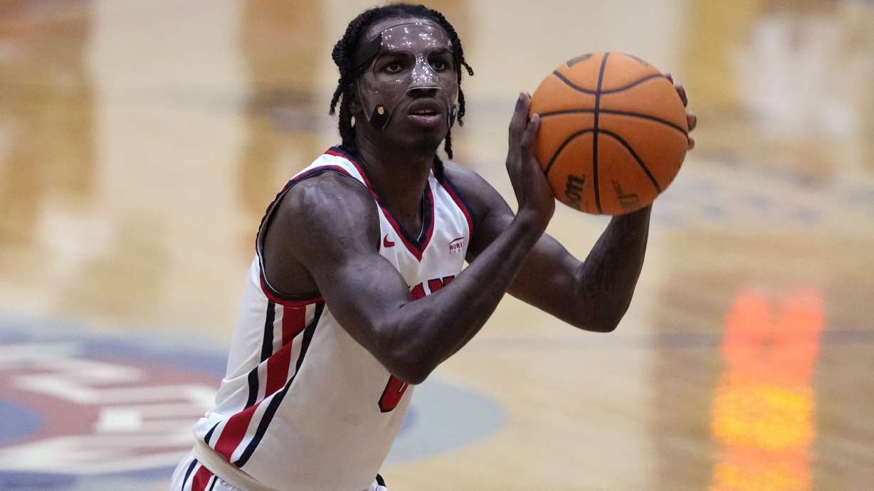 FILE - Detroit Mercy guard Antoine Davis shoots a free-throw during an NCAA college basketball game against Youngstown State, Thursday, Jan. 12, 2023, in Detroit. The Detroit Mercy's star guard needs just 26 points to surpass Pete Maravich as the NCAA's career scoring leader.