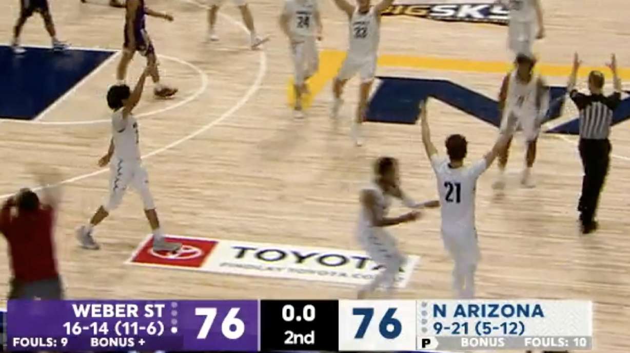 NAU's Liam Lloyd celebrates a three to send the Lumberjacks to overtime against Weber State on Feb. 27.