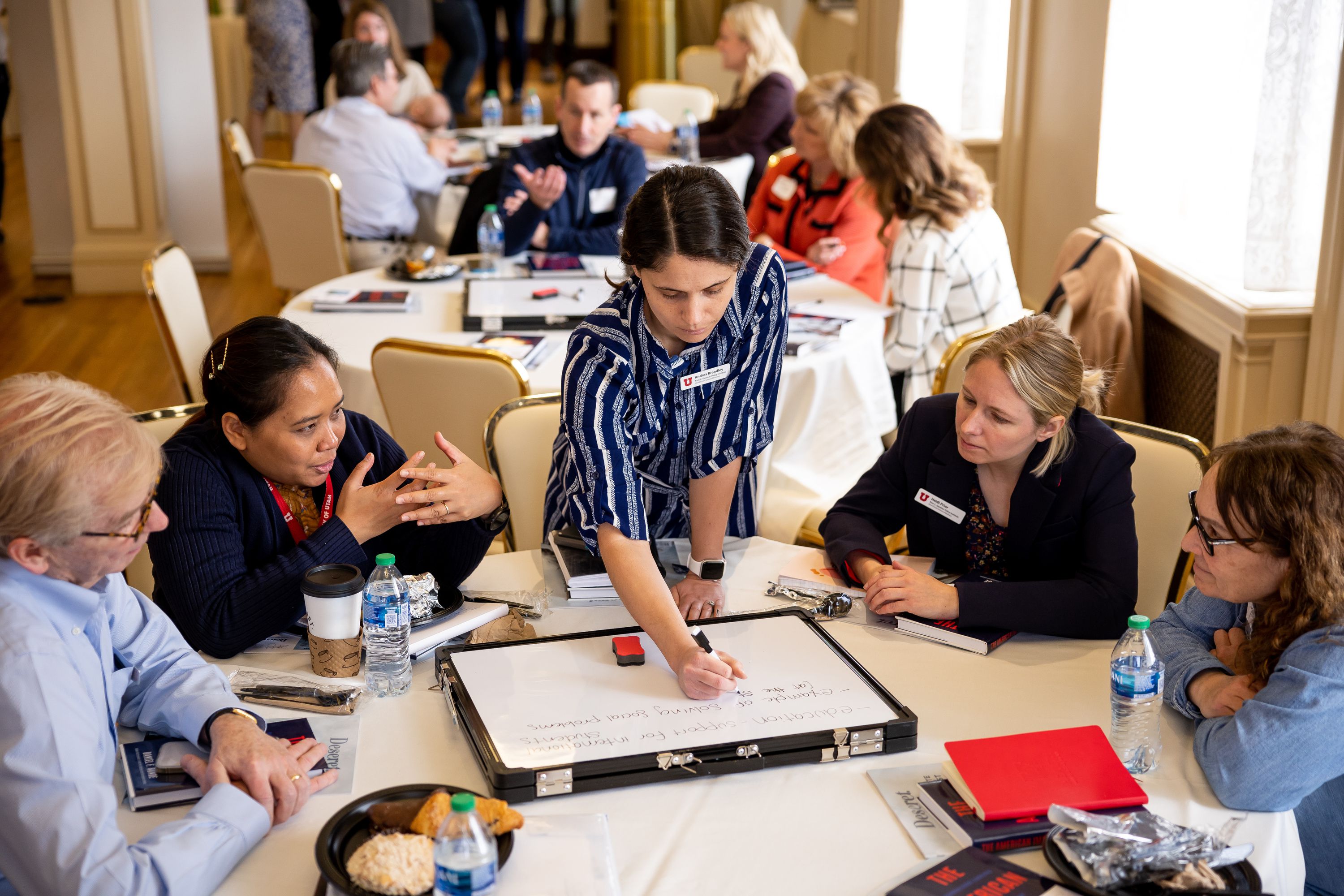 Thomas Holst, Praopan Pratoomchat, Andrea Brandley, Heidi Prior and Cindy Wilmshurst, left to right, take part in a discussion at an event hosted by Deseret Magazine at the Kem C. Gardner Policy Institute in Salt Lake City on Thursday.