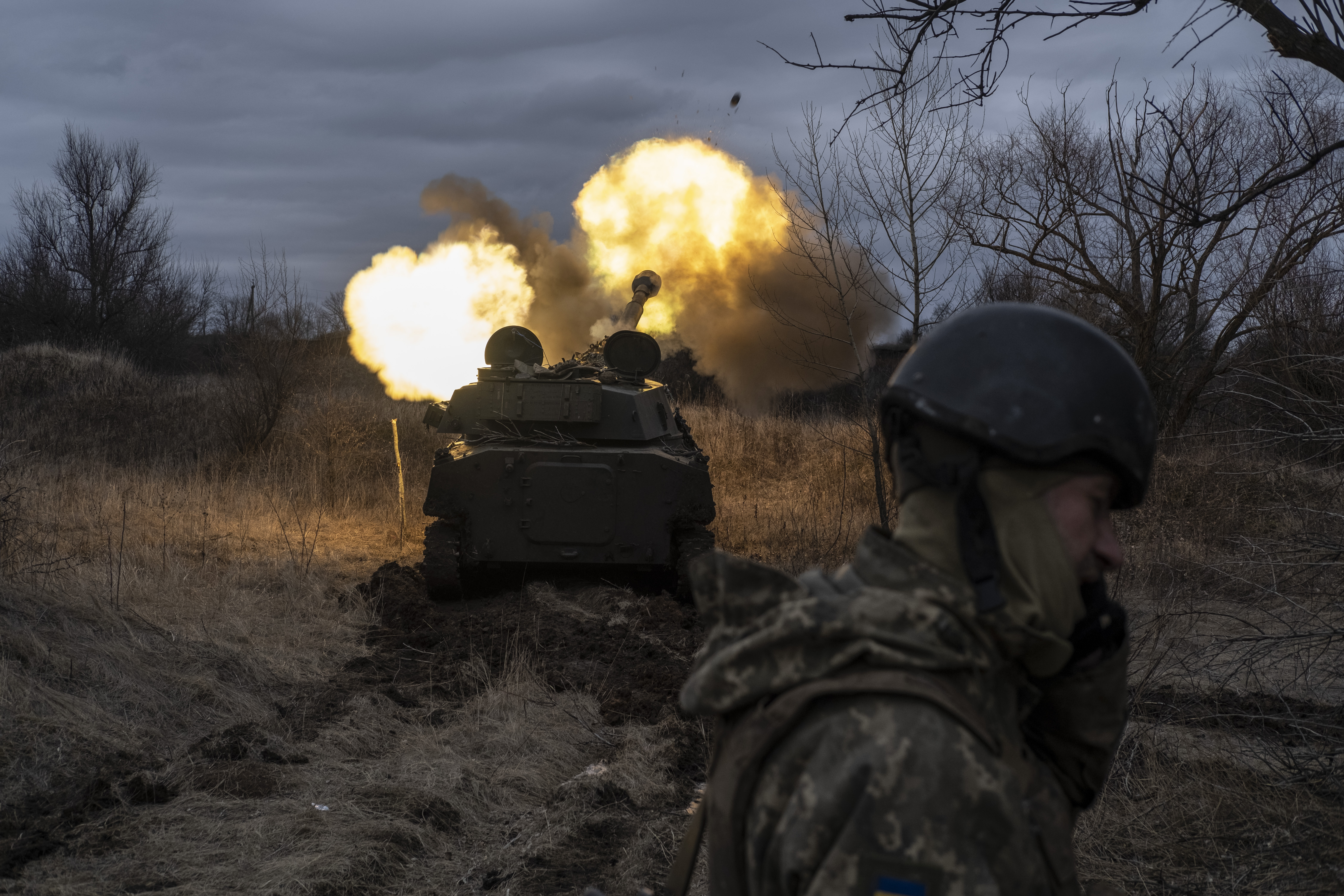 A Ukrainian self-propelled artillery vehicle fires in Donetsk region, Ukraine, Thursday. The U.S. is expected to announce a new package of military aid for Ukraine Friday, including —for the first time — eight armored vehicles that can launch bridges.