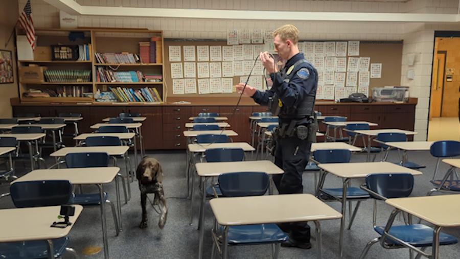 K-9 Bolt goes through some training with officer Garrett Penrose of the Granite School District Police Department Thursday in South Salt Lake.