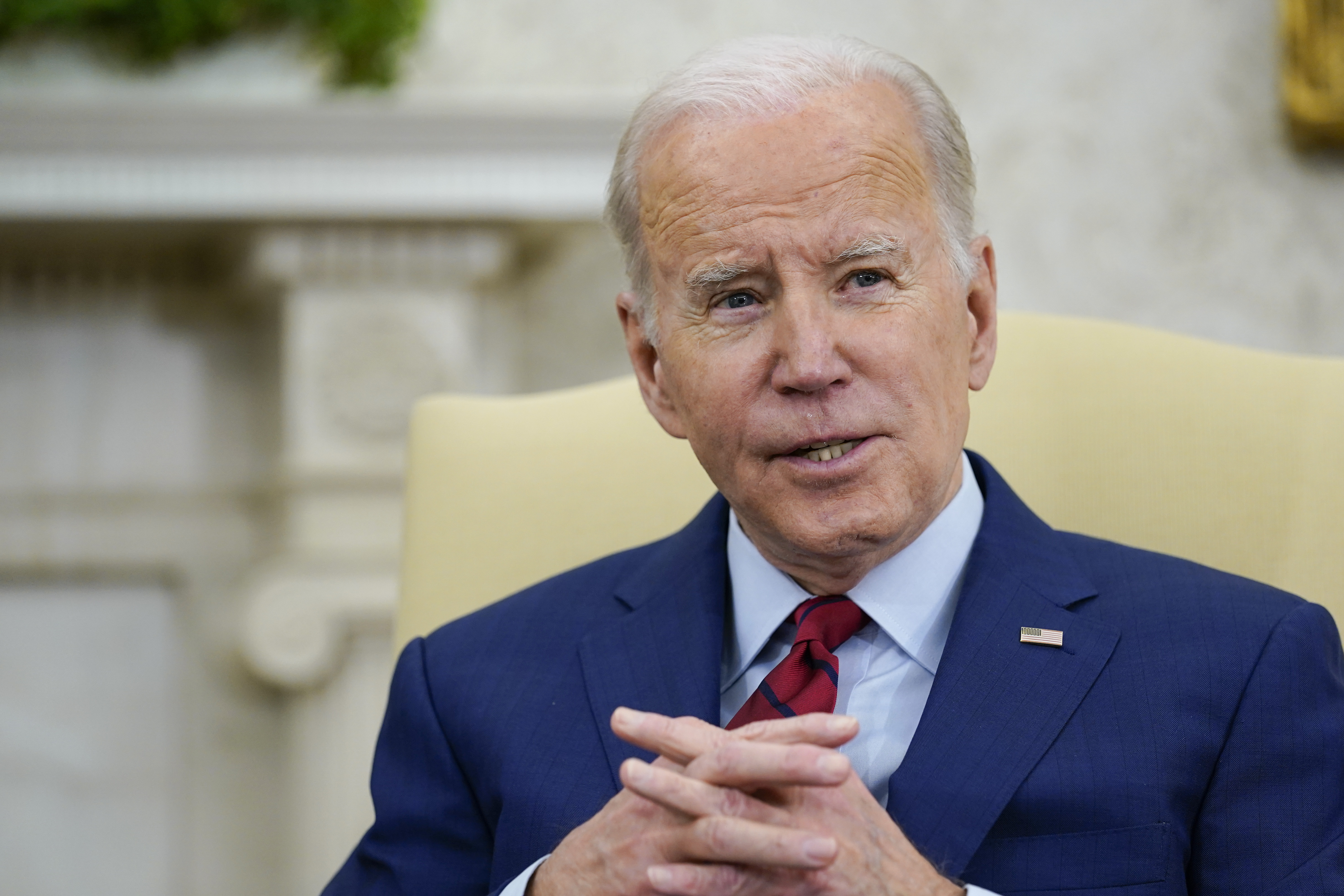 President Joe Biden speaks as he meets with German Chancellor Olaf Scholz in the Oval Office of the White House in Washington, Friday. Doctors say a skin lesion removed from Biden's chest last month was a basal cell carcinoma.