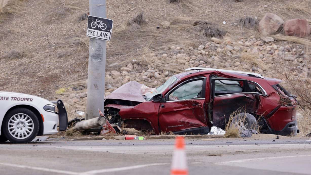 A car crashed on the 700 North offramp from I-215 in Salt Lake City on Friday.