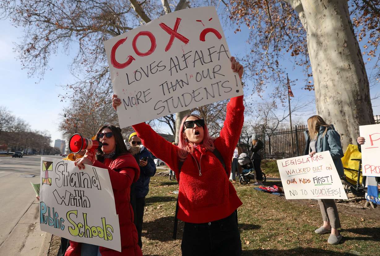 Hannah Olague and East High School teacher Elyse Arrington attend a rally in support of public education in front of the Governor’s Mansion in Salt Lake City, on Feb. 17.