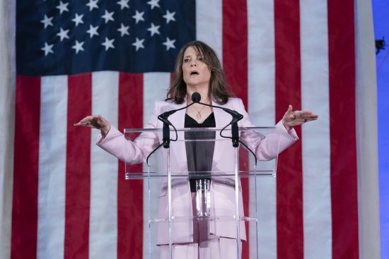 Self-help author Marianne Williamson speaks to the crowd as she launches her 2024 presidential campaign in Washington, Saturday. The 70-year-old onetime spiritual adviser to Oprah Winfrey became the first Democrat to formally challenge President Joe Biden for the 2024 nomination.