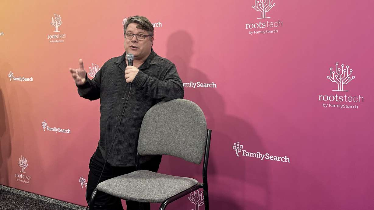 Actor Sean Astin speaks to reporters after his keynote speech at RootsTech in Salt Lake City on Saturday.