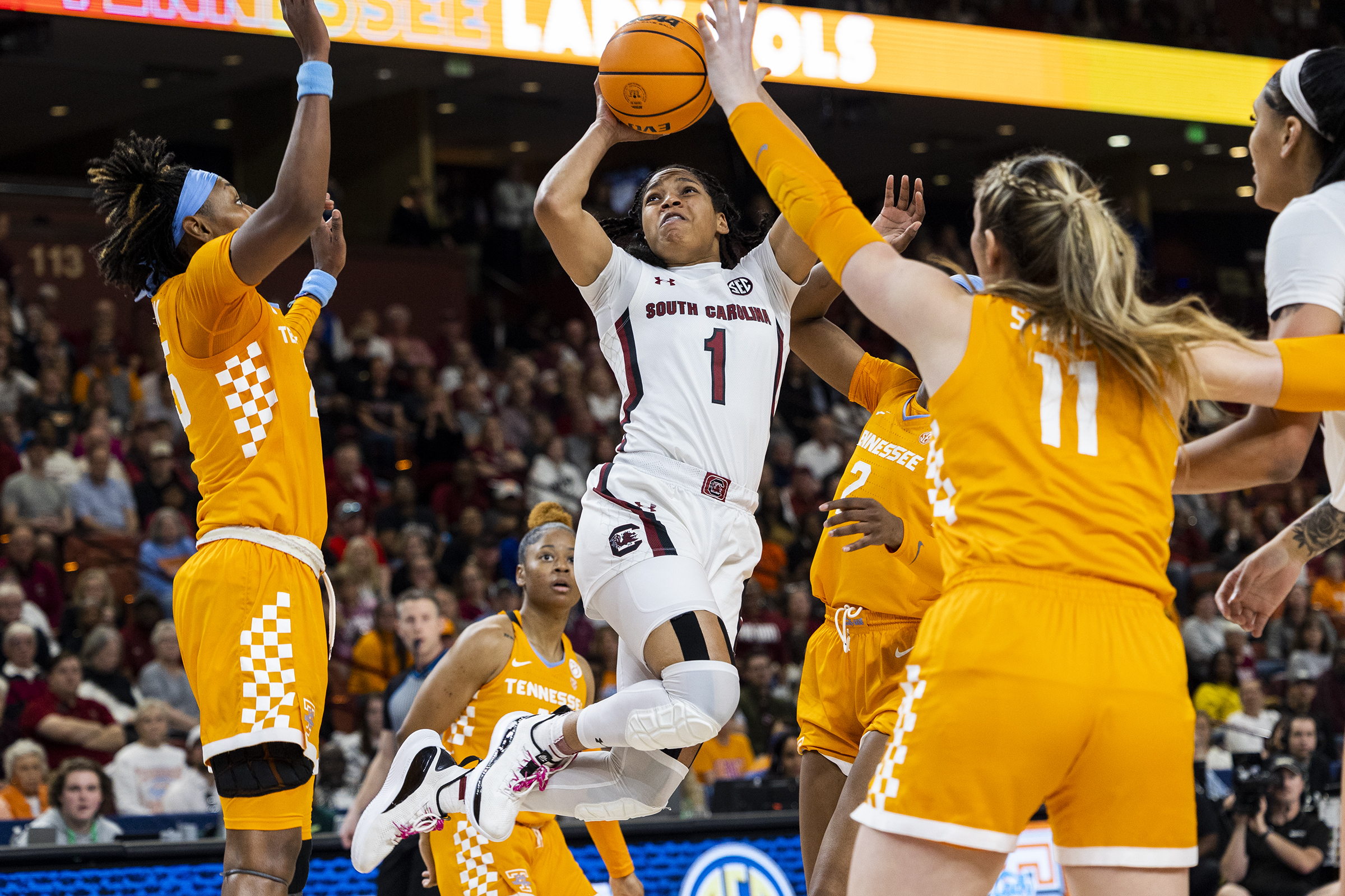 South Carolina's Zia Cooke (1) jumps through a host of Tennessee defenders in the first half of an NCAA college basketball game during the championship game of the Southeastern Conference women's tournament in Greenville, S.C., Sunday, March 5, 2023. 