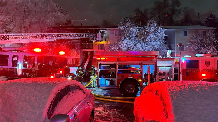 Fire crews arrive at the Liberty Heights Apartments fire in Sandy on March 5, 2023. The woman found guilty of causing the fire was sentenced to a term of 15 years to life in prison on Monday.