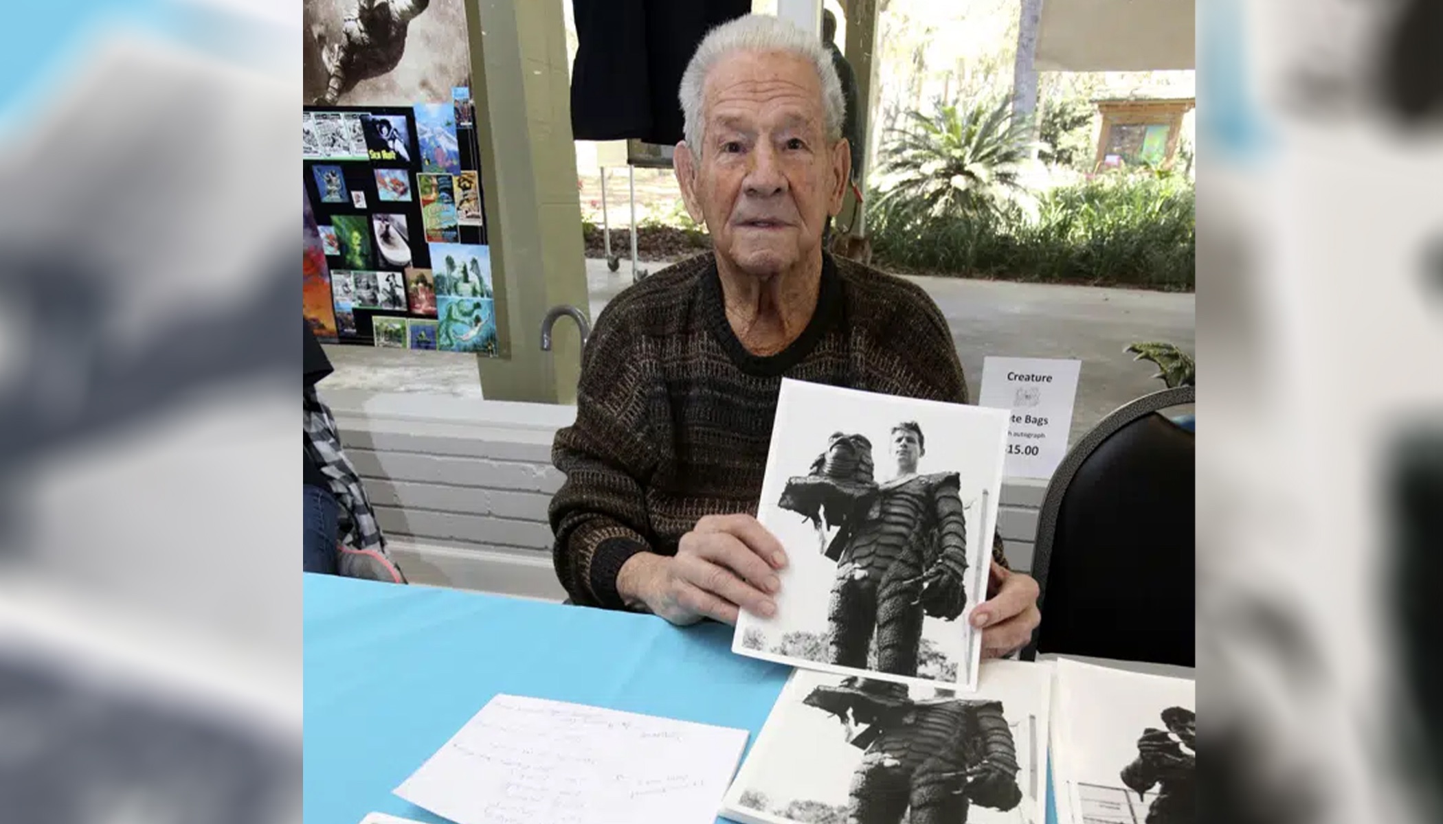 Ricou Browning, who played the creature in "Creature from the Black Lagoon," poses for photos for people during Florida SpringsFest at Silver Springs State Park in Silver Springs, Fla., March 4, 2018. Browning has died. He was 93. 