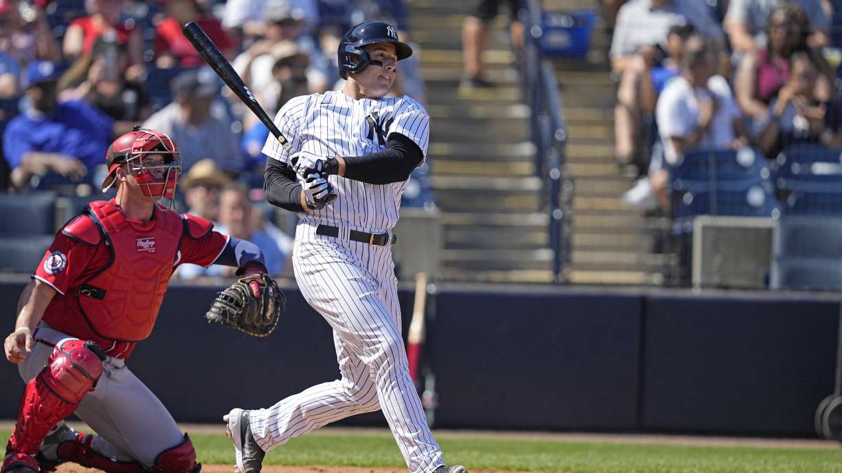 New York Yankees' Anthony Rizzo hits a single against the Washington Nationals during the fourth inning of a spring training baseball game Wednesday, March 1, 2023, in Tampa, Fla.