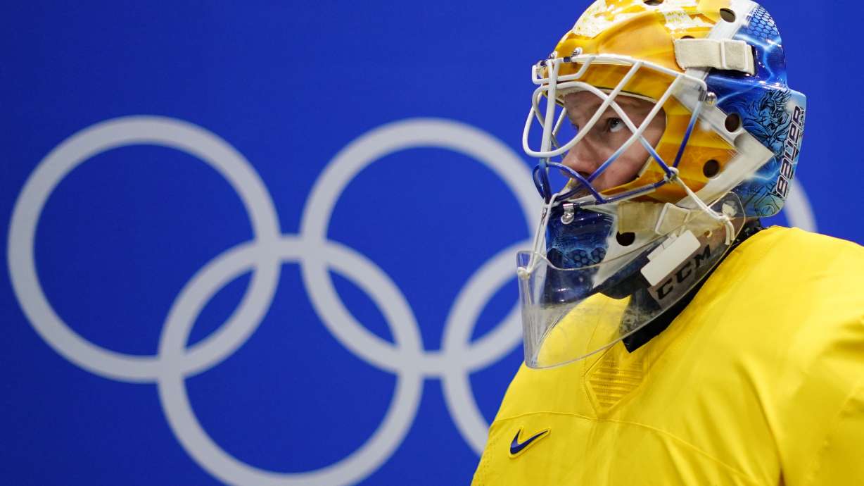 Sweden goalkeeper Magnus Hellberg plays against Slovakia at the 2022 Winter Olympics on Feb. 19 in Beijing. The International Olympic Committee confirmed "confidential discussions" are underway with six places about hosting a future Winter Games.