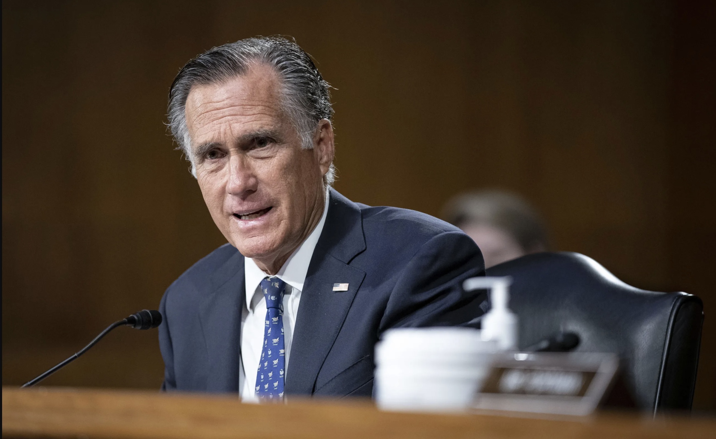 Sen. Mitt Romney, R-Utah, speaks in Washington on April 26, 2022. Romney and 11 other senators are united in challenging the technological threat from China.