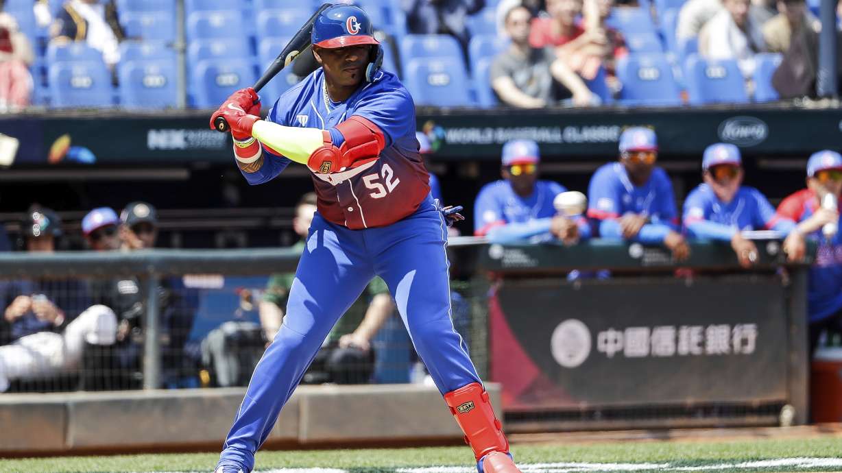 Cuba Yoenis Cespedes gets a hit during the Pool A game against Netherlands in the World Baseball Classic at Taichung Intercontinental Baseball Stadium in Taichung, Taiwan on Wednesday, March 8, 2023.