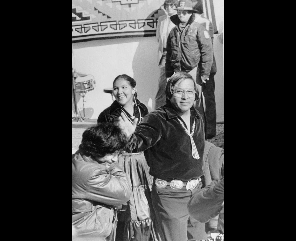 Peterson Zah waves to supporters as he arrives at the Navajo Nation tribal fairgrounds in Window Rock, Ariz. on Jan. 11, 1983. Zah, a monumental Navajo Nation leader who guided the tribe through a politically tumultuous era and worked tirelessly to correct wrongdoings against Native Americans, has died.