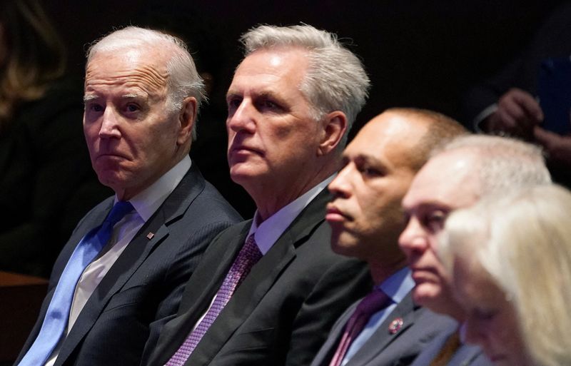 President Joe Biden sits beside House Speaker Kevin McCarthy and House Minority Leader Hakeem Jeffries during the National Prayer Breakfast at the Capitol in Washington, Feb. 2. U.S. House Republicans plan to focus on the federal government's $31.4 trillion debt in a closed-door meeting on Wednesday