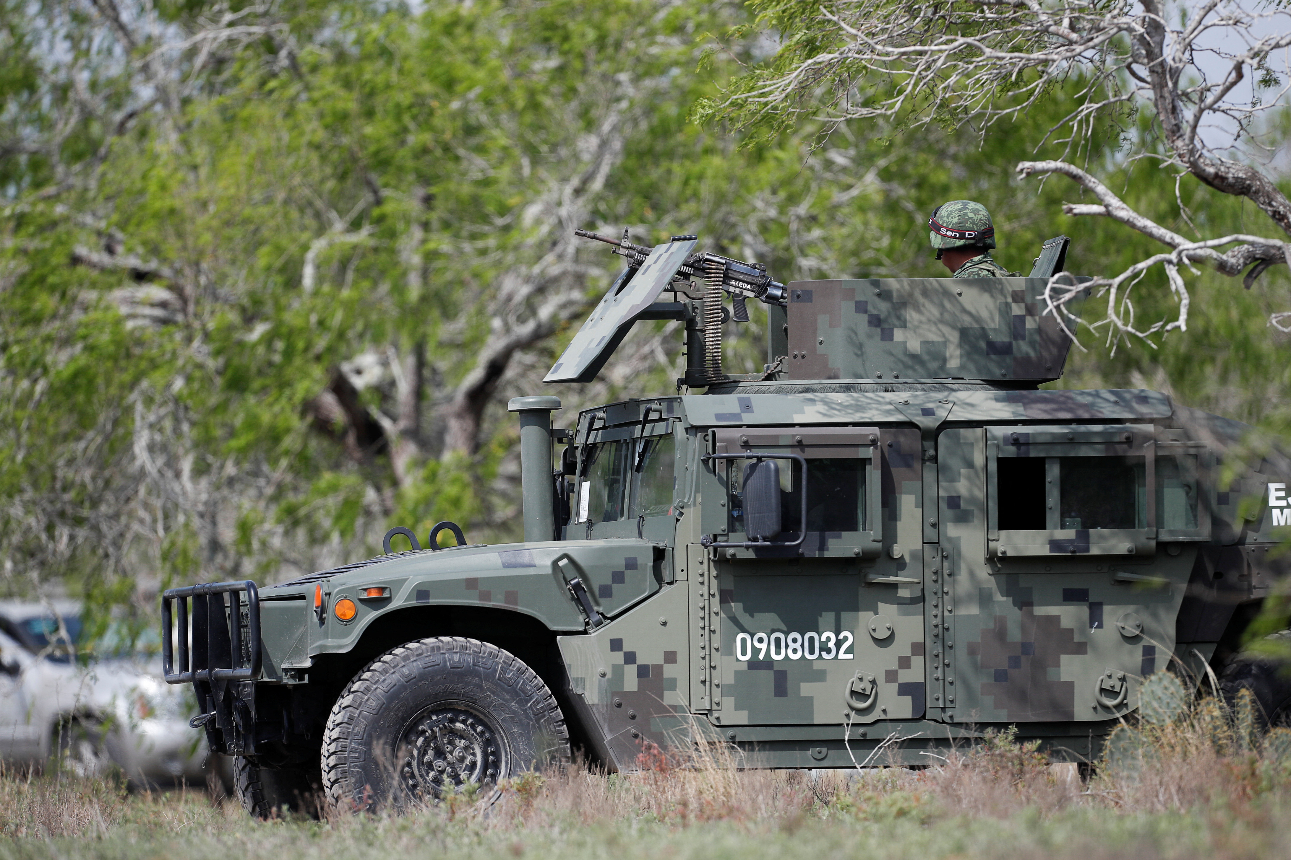 Military personnel keeps watch at the scene where authorities found the bodies of two of four Americans kidnapped by gunmen, in Matamoros, Mexico, Tuesday.