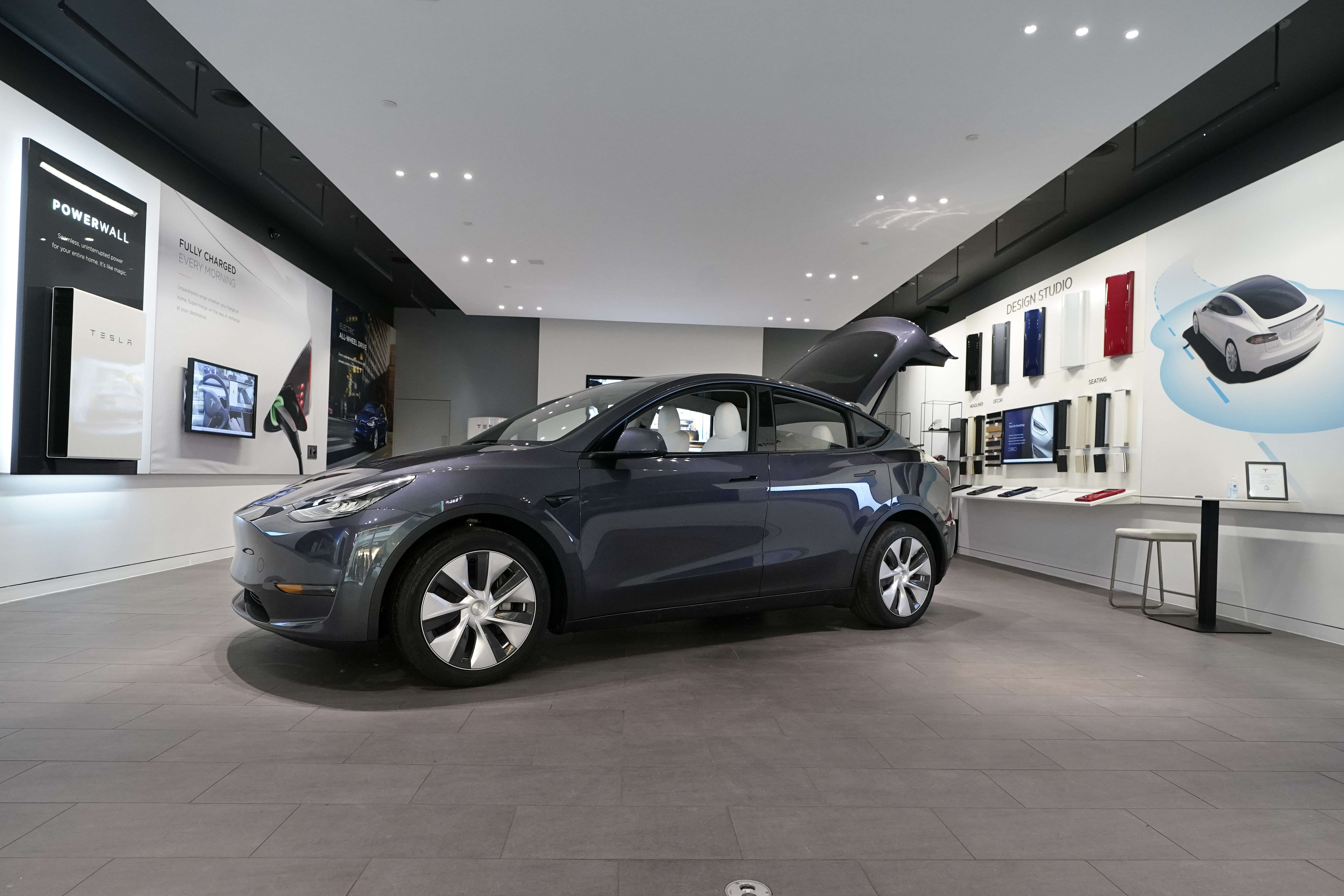 FILE - A Tesla Model Y Long Range is displayed on Feb. 24, 2021, at the Tesla Gallery in Troy, Mich. U.S. auto safety regulators have opened an investigation into Tesla’s Model Y SUV after getting two complaints that the steering wheels can come off while being driven. The National Highway Traffic Safety Administration says the probe covers an estimated 120,000 vehicles from the 2023 model year. 