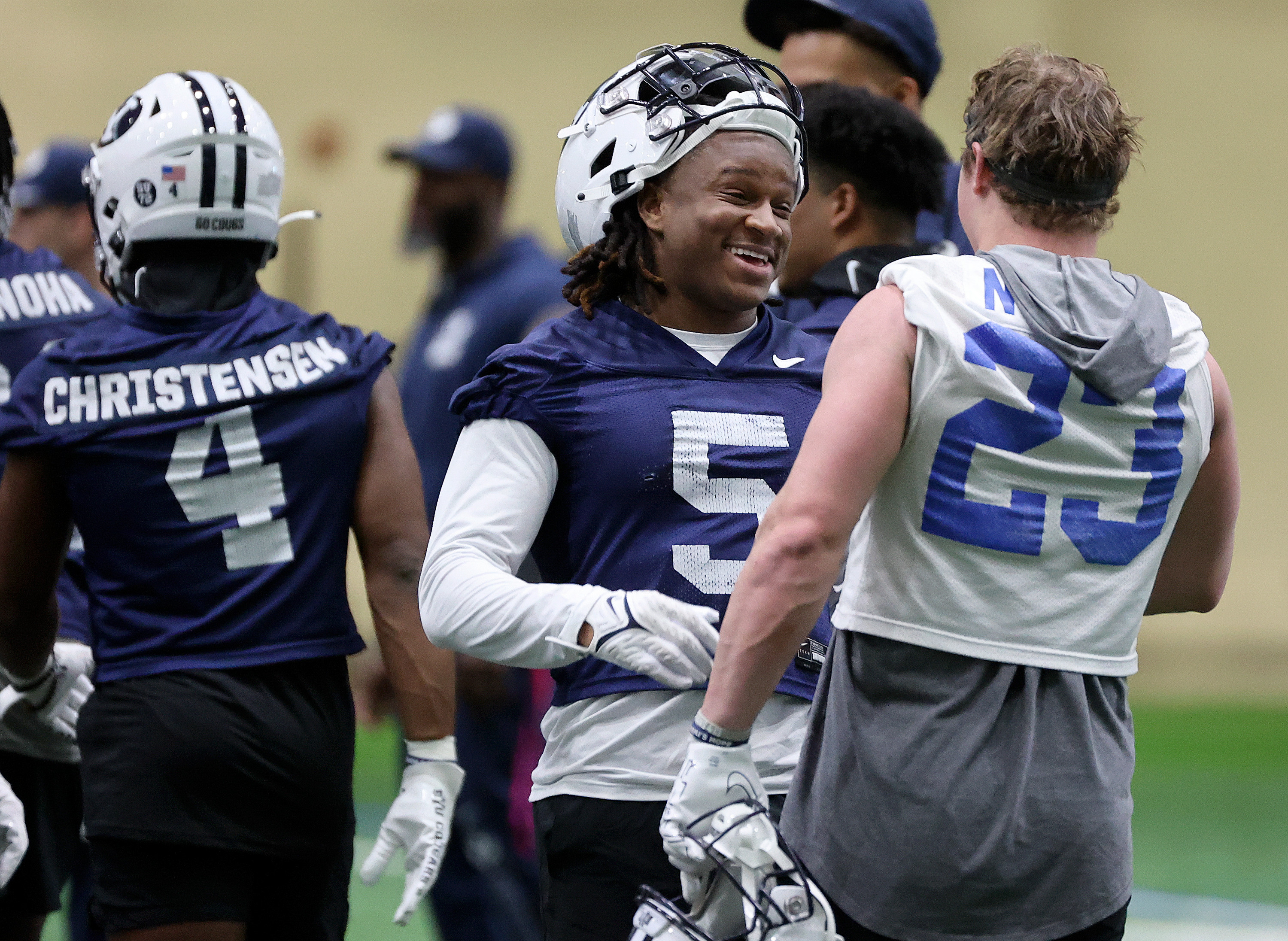 BYU cornerback Eddie Heckard and BYU wide receiver Hobbs Nyberg chat at the end of opening day of BYU spring football camp at the BYU Indoor Practice Facility in Provo, on Monday, March 6, 2023.