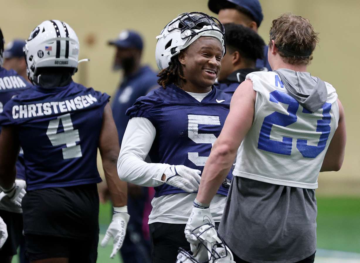 BYU cornerback Eddie Heckard and BYU wide receiver Hobbs Nyberg chat at the end of opening day of BYU spring football camp at the BYU Indoor Practice Facility in Provo, on Monday, March 6, 2023.