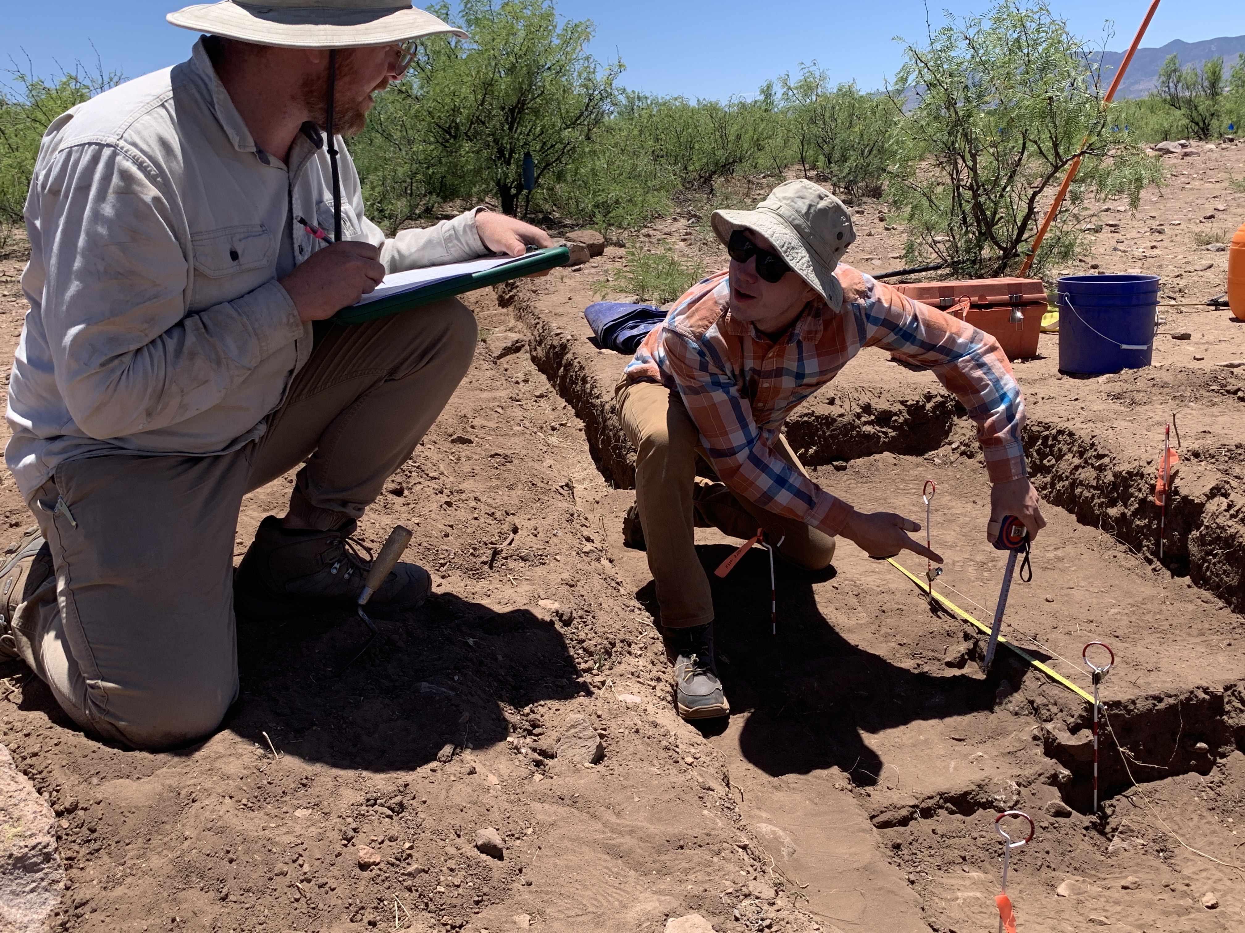BYU students Jake Hubbert and James Hall map a midden (trash pit) that was found during excavations at the San Diego site. A group of BYU professors and students braved the heat of the Mexican desert in search of ancient artifacts.