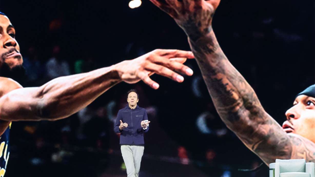 Ryan Smith, executive chairman and co-founder of Qualtrics, speaks during the Qualtrics X4: The Experience Management Summit at the Salt Palace in Salt Lake City on Wednesday.