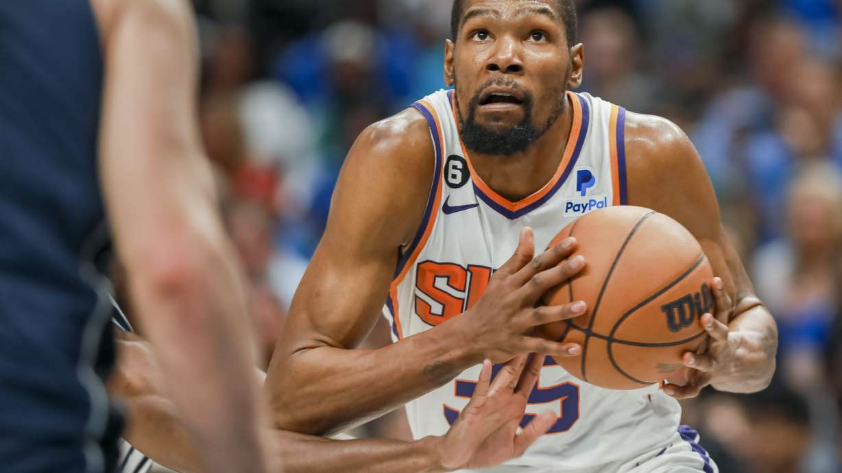 Phoenix Suns forward Kevin Durant (35) drives to the basket during the second half of an NBA basketball game against the Dallas Mavericks, Sunday, March 5, 2023, in Dallas.
