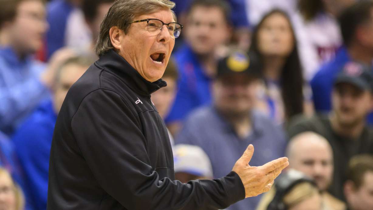 Texas Tech head coach Mark Adams calls instructions to his team against Kansas during the first half of an NCAA college basketball game in Lawrence, Kan., Tuesday, Feb. 28, 2023.