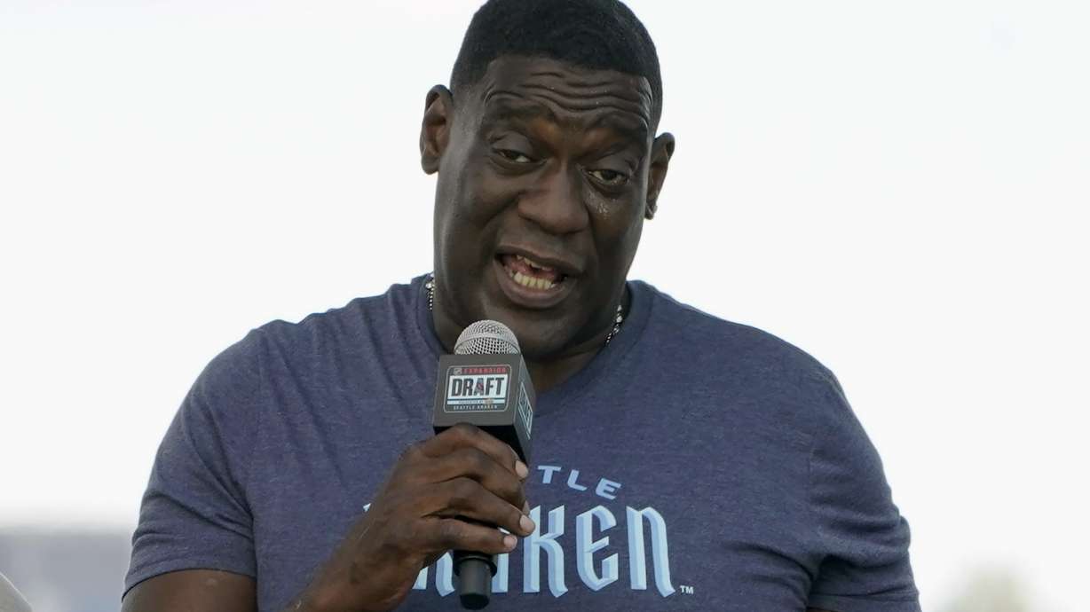 FILE - Former NBA basketball player Shawn Kemp speaks during the Seattle Kraken's NHL hockey expansion draft event in Seattle, July 21, 2021. Shawn Kemp was arrested and charged in connection with a drive-by shooting in Tacoma, Washington, a Pierce County sheriff's official said Thursday, March 9, 2023. Online jail records show Kemp was booked on a felony charge of drive-by shooting. Sheriff spokesman Darren Moss said Kemp, 53, was scheduled to appear in court Thursday afternoon.