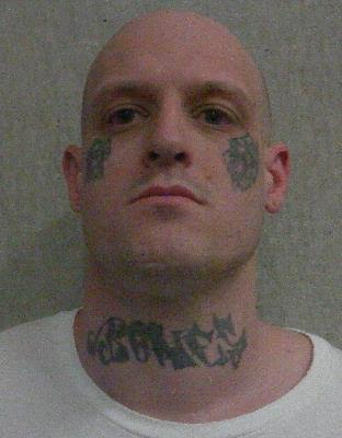 Travis Brandon Bennett, 34, was charged with aggravated assault by a prisoner in connection with a vicious attack on a corrections officer at Utah's state prison in February. 