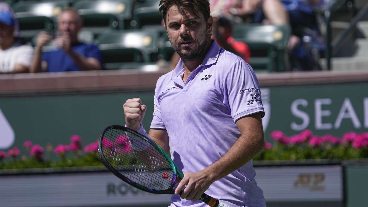 Stan Wawrinka, of Switzerland, reacts after scoring a point against Aleksandar Vukic, of Australia, at the BNP Paribas Open tennis tournament Thursday, March 9, 2023, in Indian Wells, Calif.