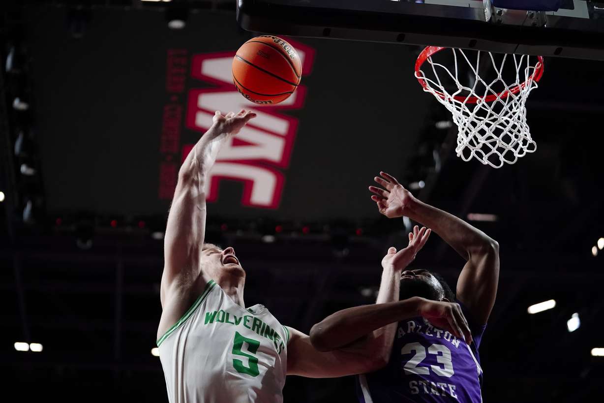 Utah Valley wing Trey Woodbury scores during the second half of the Wolverines' WAC Tournament quarterfinal against Tarleton State, Thursday, March 9, 2023 at Orleans Arena in Las Vegas.