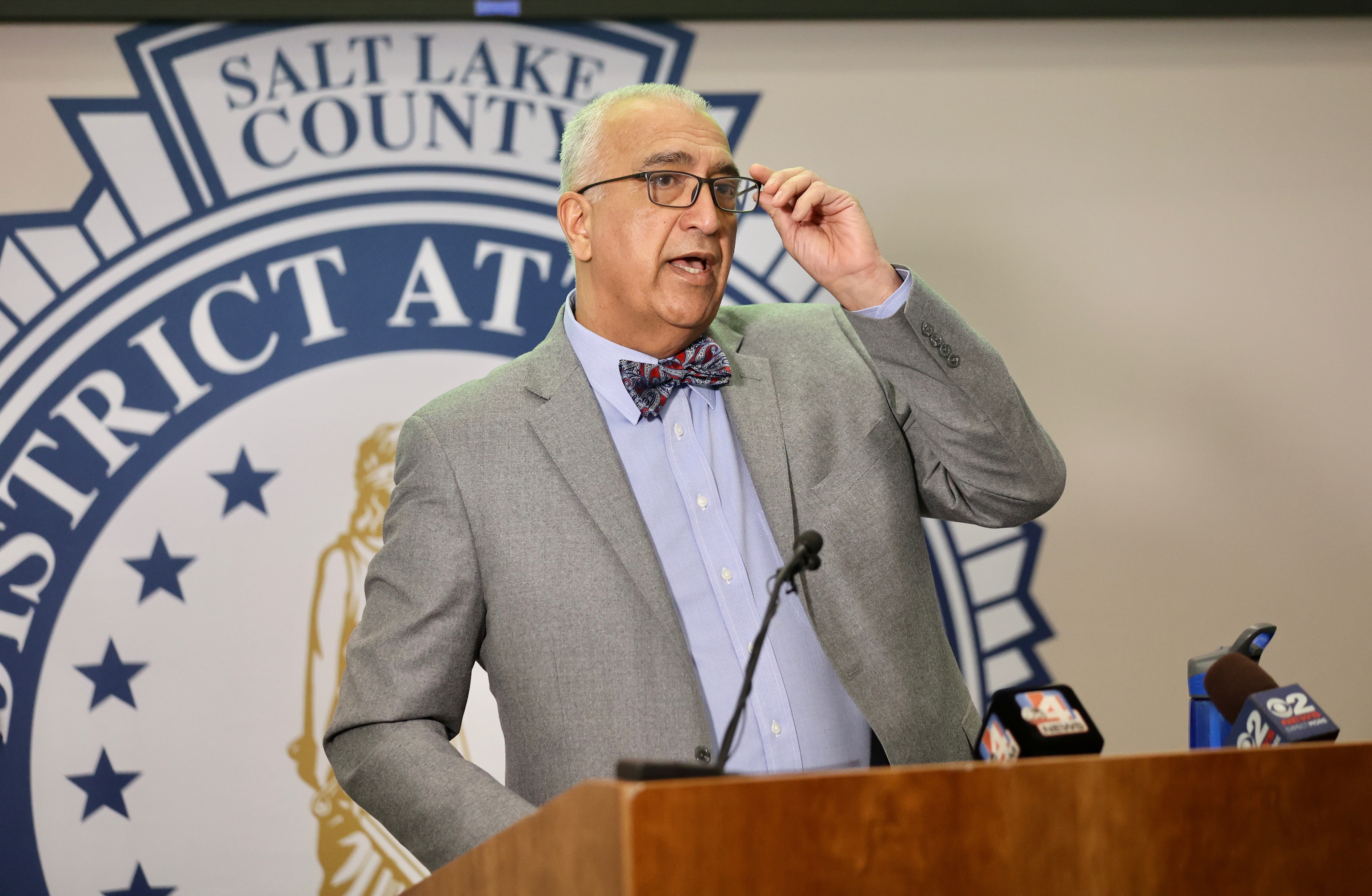 Nearly a dozen officers involved in a tense standoff that culminated in a shootout between police and a wanted gang member — resulting in the death of the gunman, Anei Gabriel Joker, and three officers being injured — were legally justified in using deadly force. That conclusion was reached by Salt Lake County District Attorney Sim Gill in an announcement Friday.