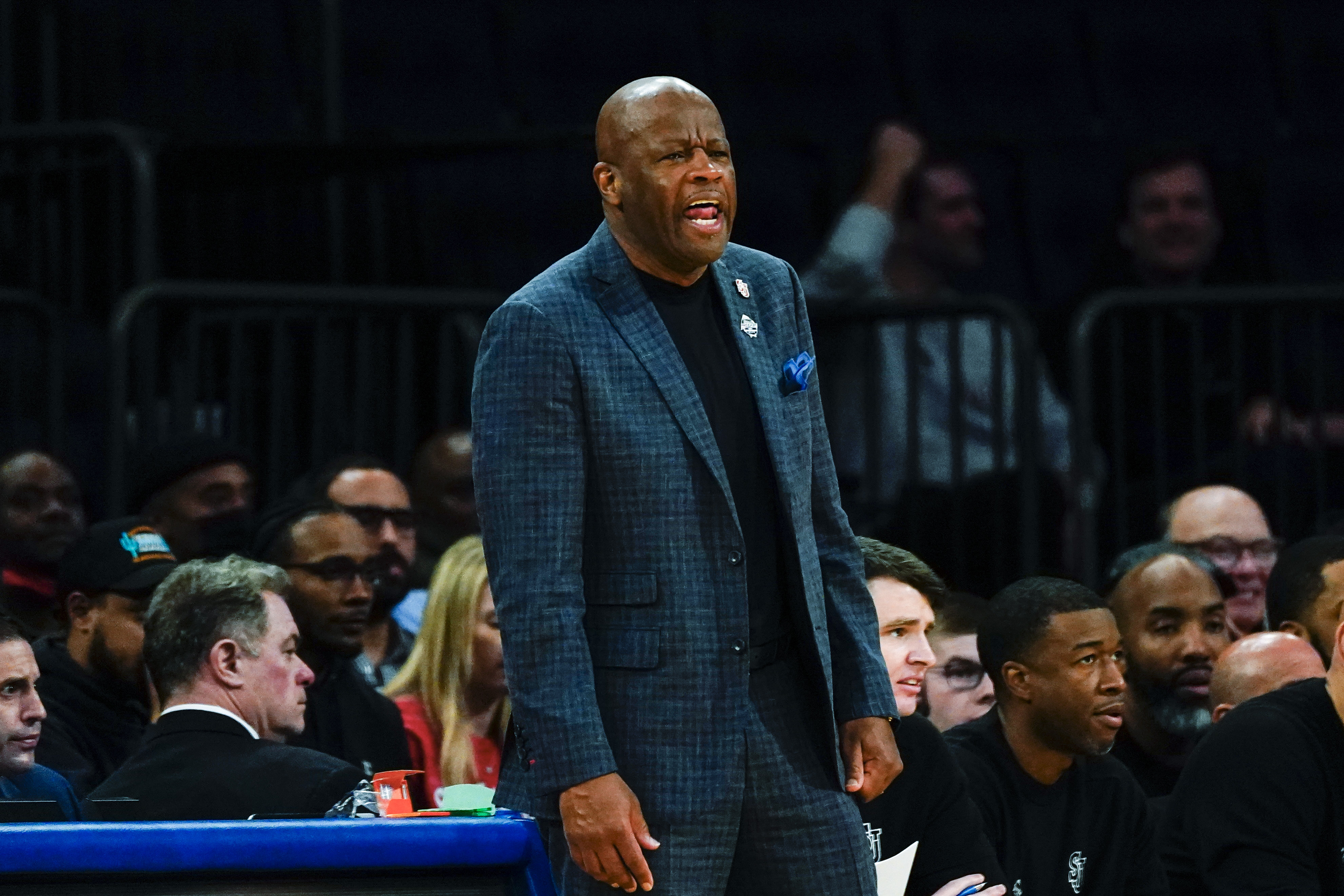St. John's head coach Mike Anderson calls out to his team during the first half of an NCAA college basketball game against Butler in the first round of the Big East conference tournament Wednesday, March 8, 2023, in New York. 