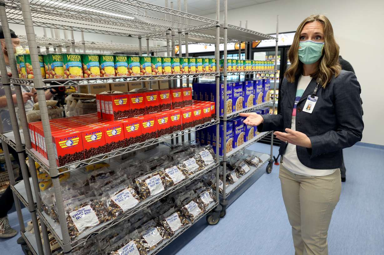 Jessica Strong, Intermountain Primary Children’s Hospital community health director, shows the new Primary Pantry, where patients can get free food.