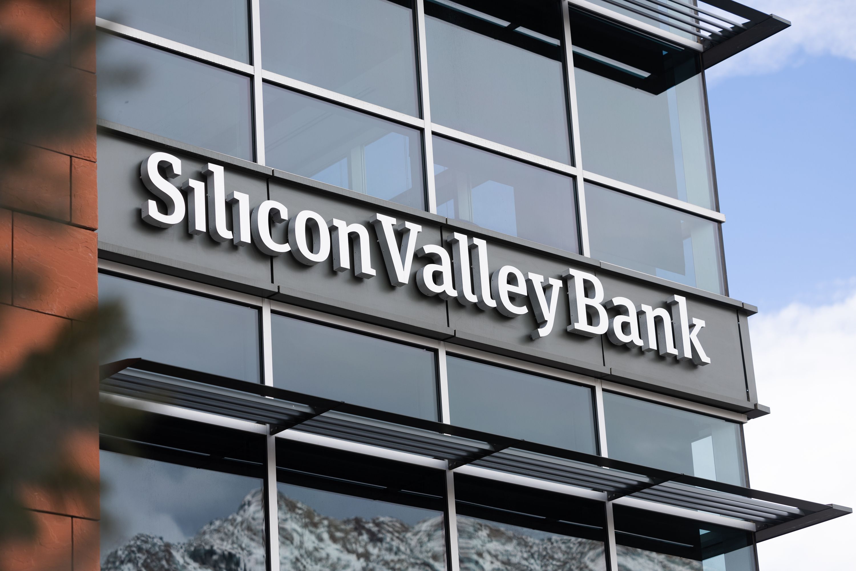 The sign of Silicon Valley Bank is photographed in Cottonwood Heights on Friday. The Federal Deposit Insurance Corp. seized assets of California-based Silicon Valley Bank on Friday.