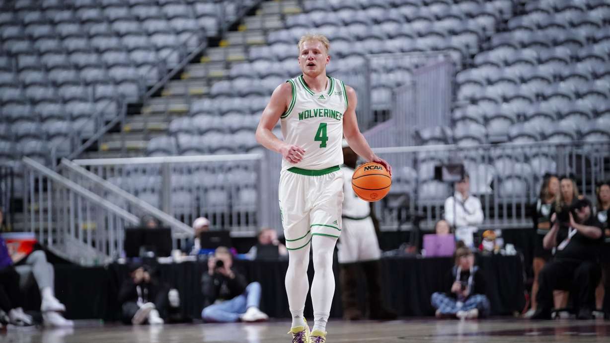 Utah Valley guard Trey Woodbury dribbles the ball in the first half of a WAC Tournament semifinal against Southern Utah, Friday, March 10, 2023 at Orleans Arena in Las Vegas.