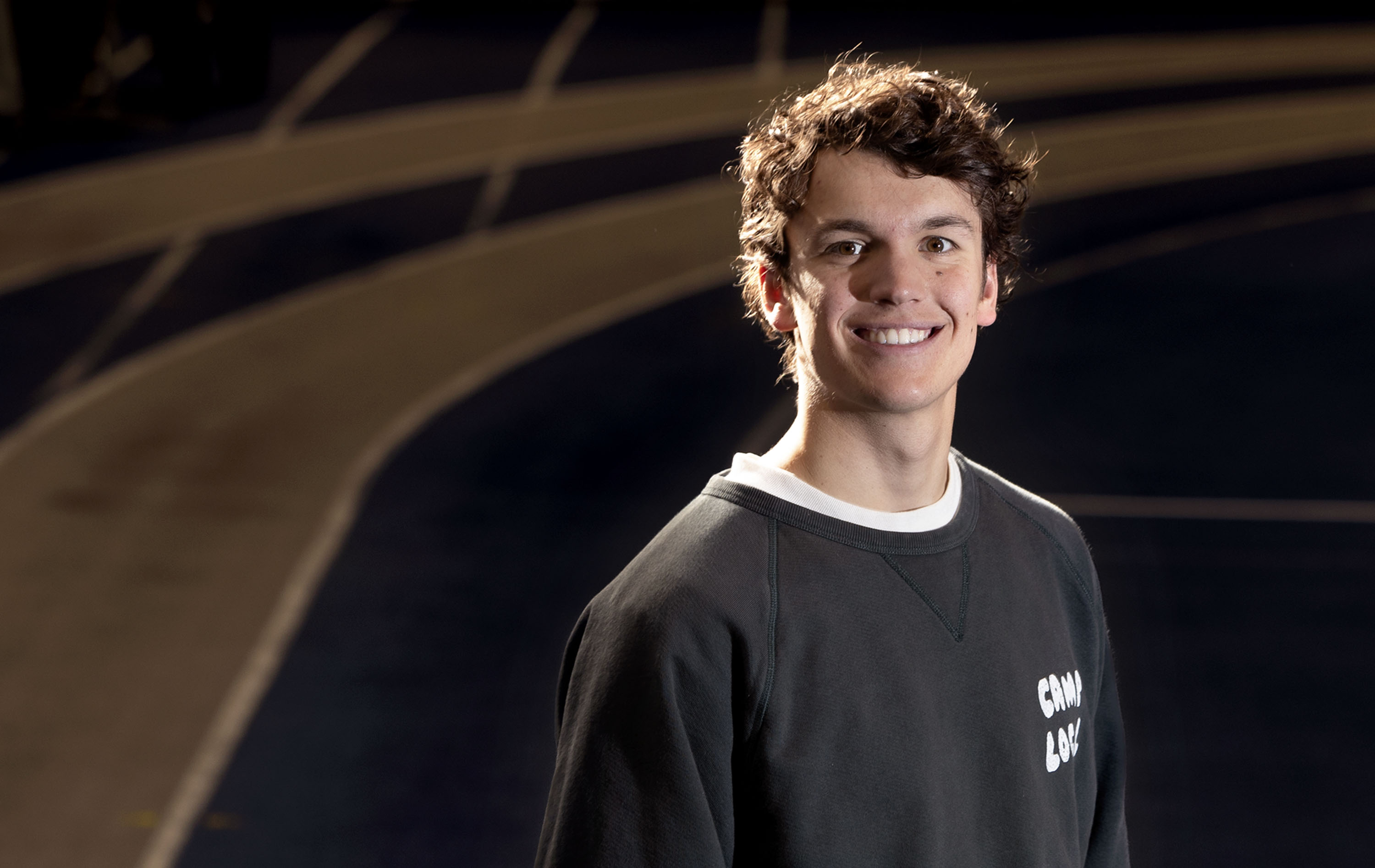 Former BYU track and field athlete Easton Allred is photographed at the school’s indoor track in Provo on March 2. Allred was a rising star on the BYU track team — until a disease knocked him off the track.