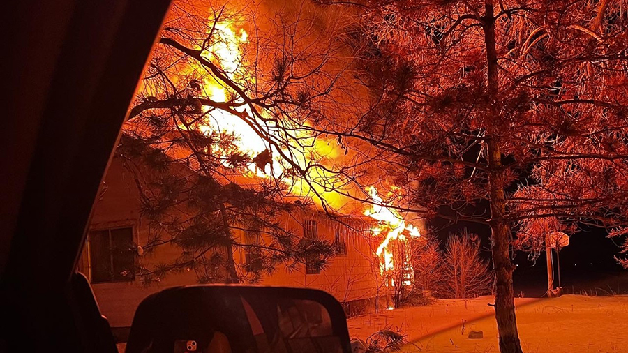 Fire consumes LaMar Cutler's Deweyville, Box Elder County, home on Monday. The century-old structure was destroyed in the blaze.