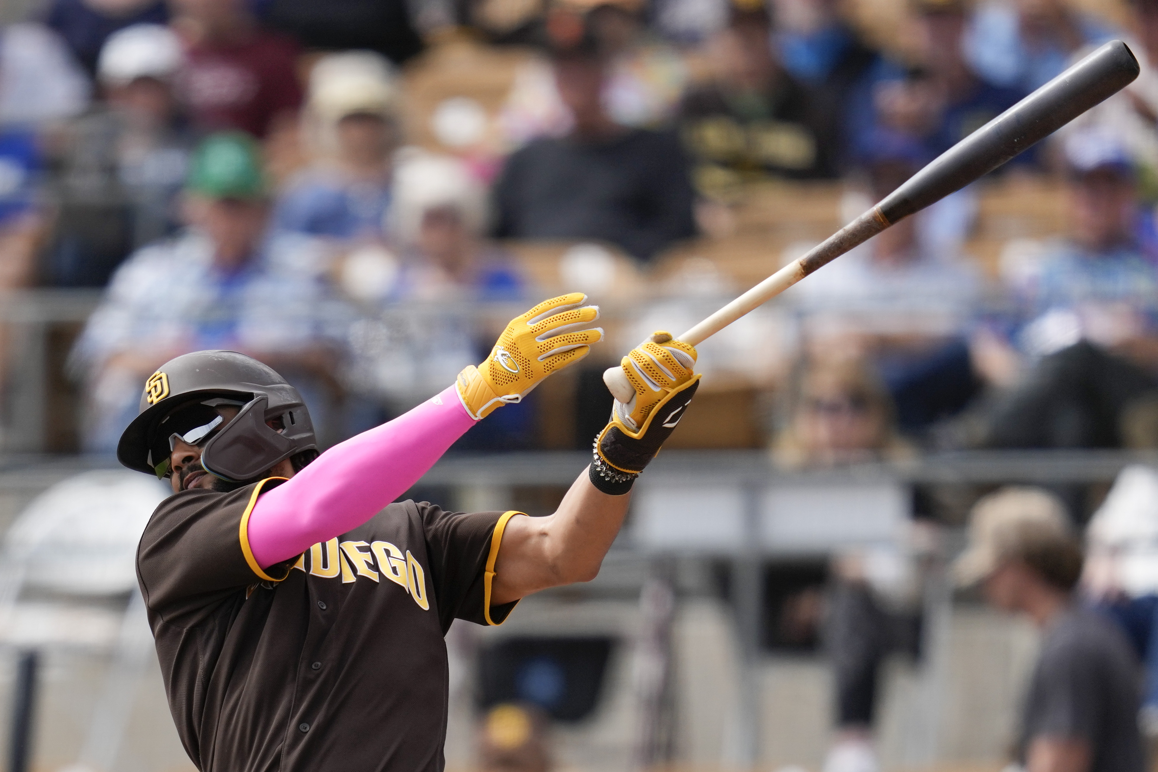 San Diego Padres' Fernando Tatis Jr. (23) pops out to second base during the first inning of a spring training baseball game against the Los Angeles Dodgers in Glendale, Calif., Monday, March 6, 2023. 