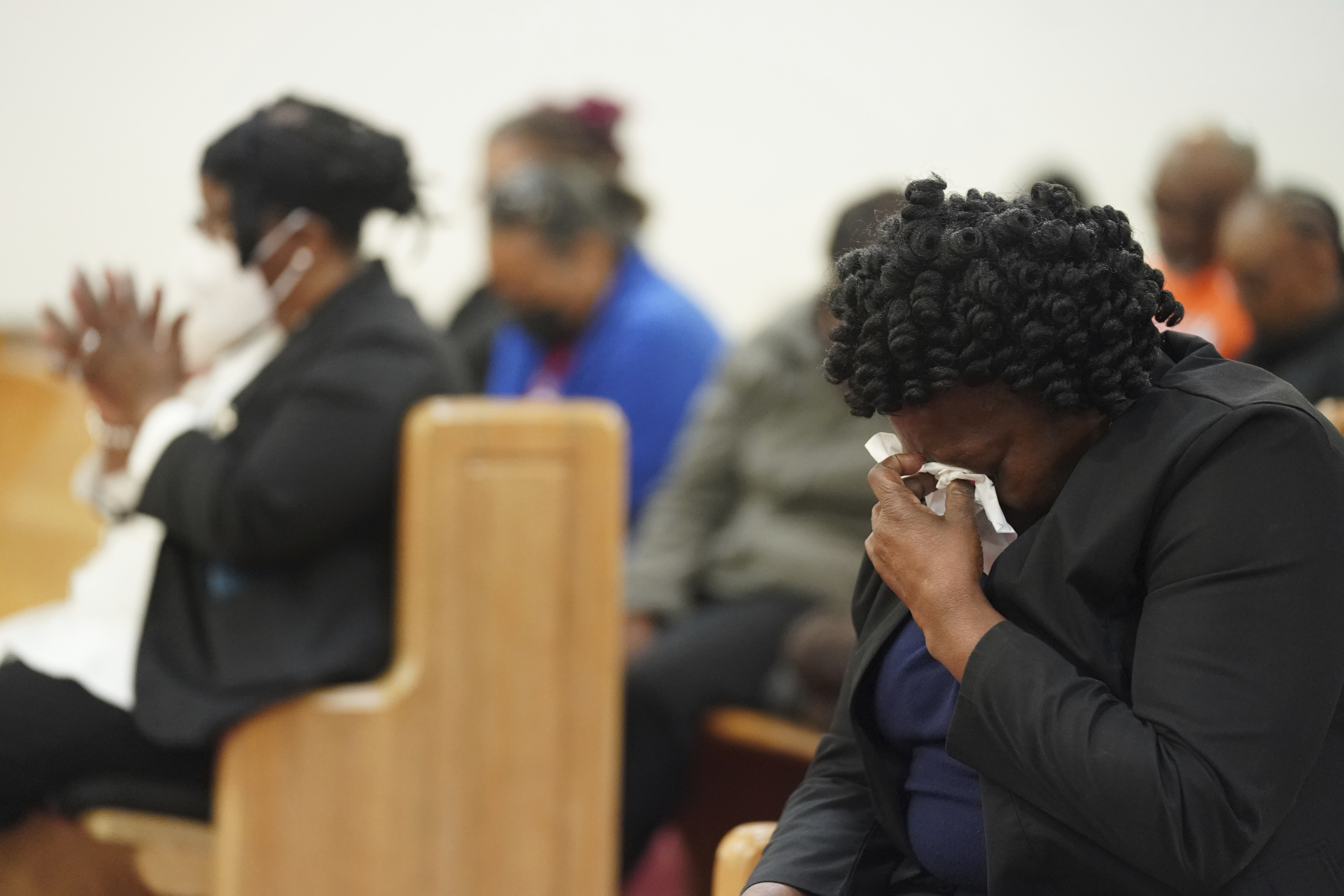 Elder Sharon Hammond uses a tissue during a vigil for a group of Americans recently kidnapped in Mexico, at Word of God Ministries in Scranton, South Carolina March 8. Two of the four Americans, all from South Carolina, were killed after being caught in a deadly shootout.