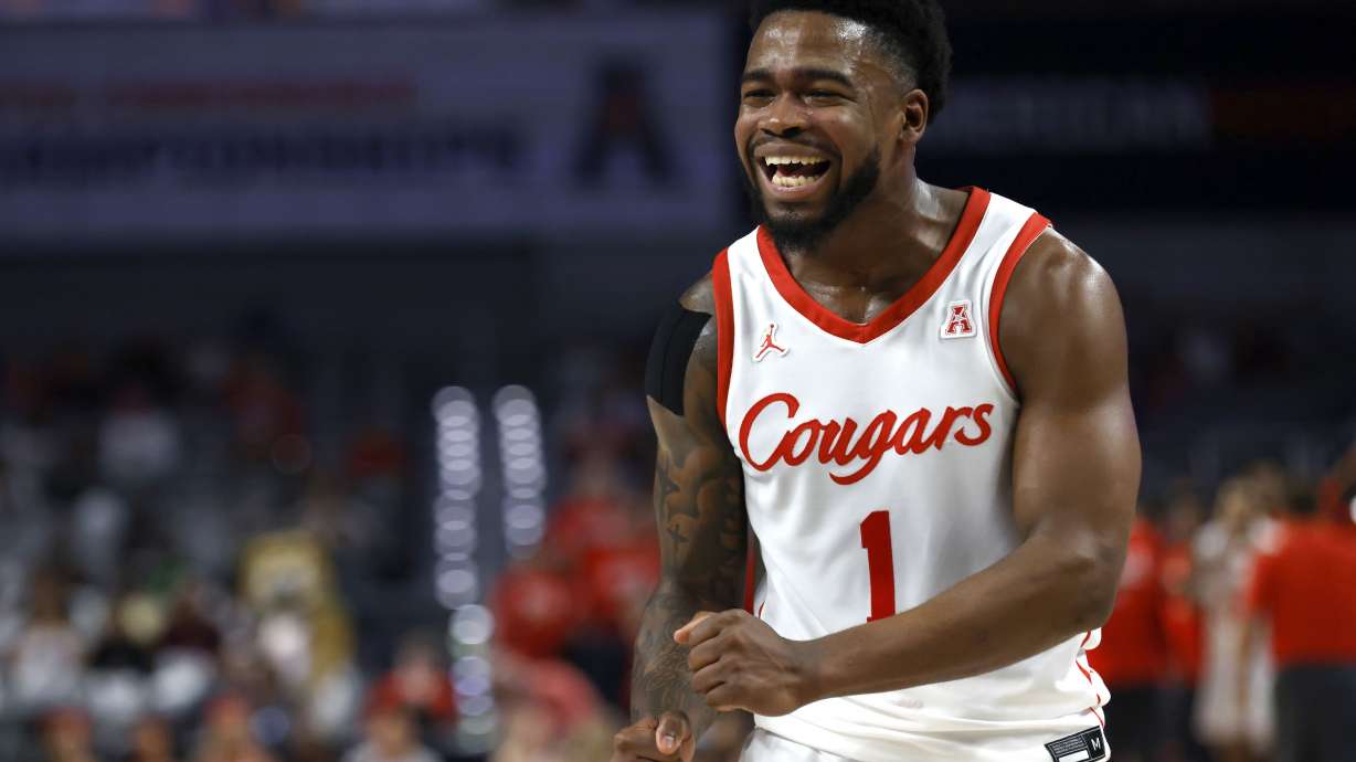 Houston guard Jamal Shead (1) reacts after a basket against Cincinnati during the first half of an NCAA college basketball game in the semifinals of the American Athletic Conference Tournament, Saturday, March 11, 2023, in Fort Worth, Texas.