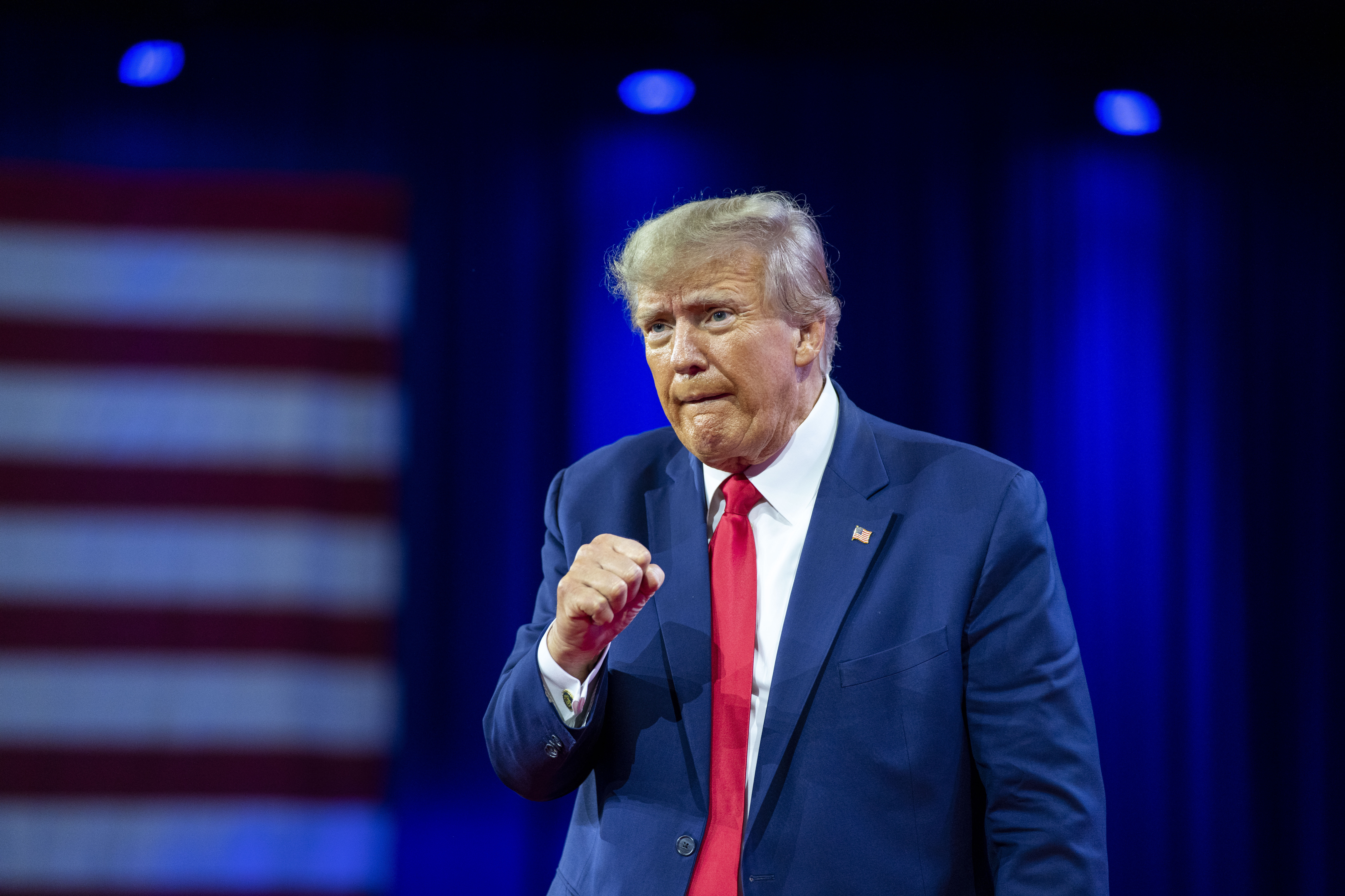 Former President Donald Trump pumps his fist after speaking at the Conservative Political Action Conference, March 4, Oxon Hill, Md. The Manhattan district attorney's office appears to be getting close to a decision on whether to charge Donald Trump over hush-money payments to Stormy Daniels during his 2016 presidential campaign.