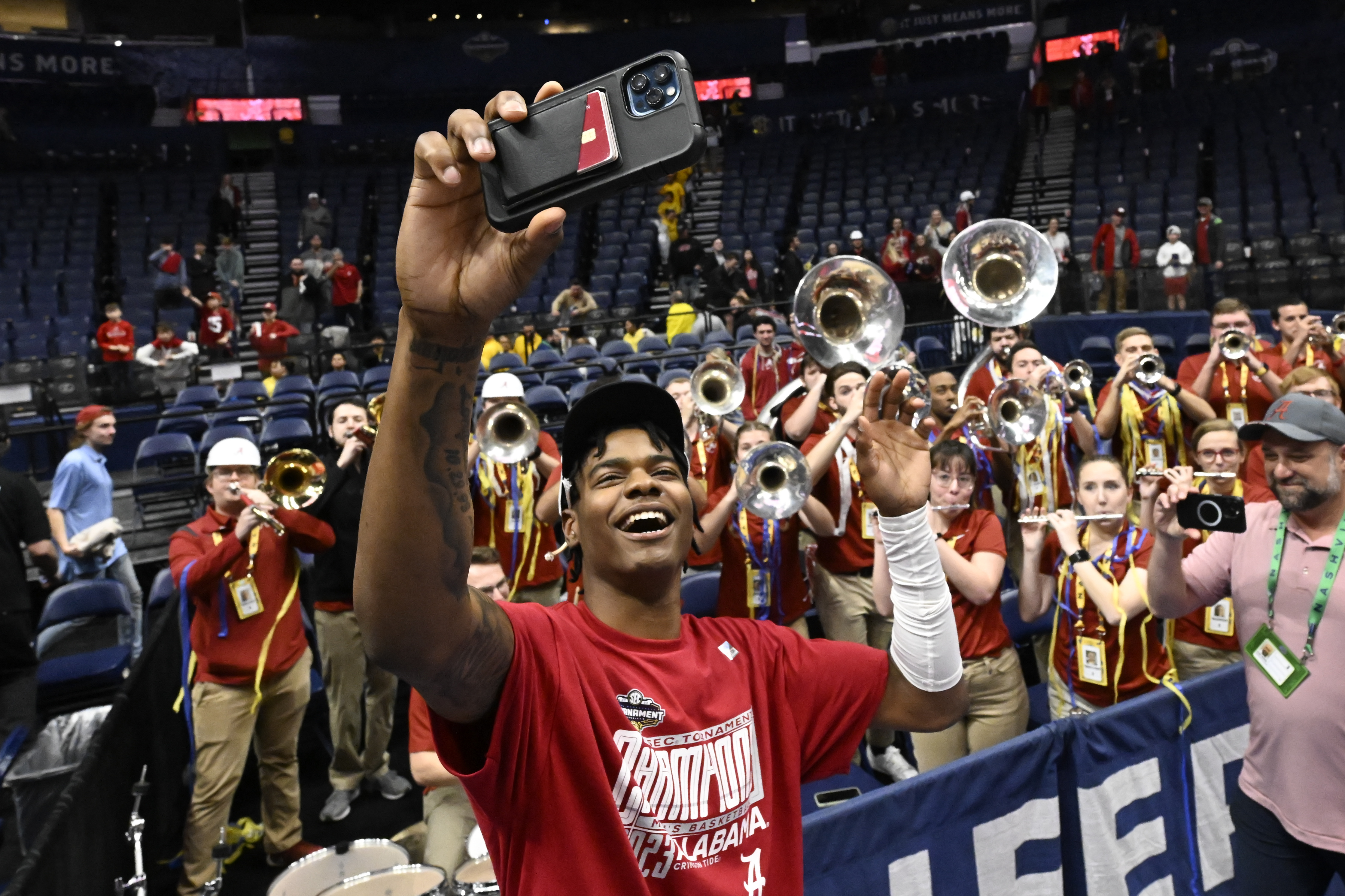 Alabama forward Nick Pringle celebrates after an NCAA college basketball game against Texas A&M in the finals of the Southeastern Conference Tournament, Sunday, March 12, 2023, in Nashville, Tenn. Alabama won 82-63. 