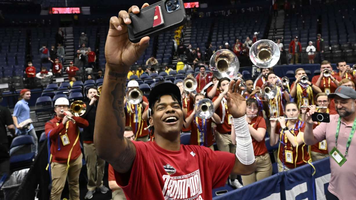 Alabama forward Nick Pringle celebrates after an NCAA college basketball game against Texas A&M in the finals of the Southeastern Conference Tournament, Sunday, March 12, 2023, in Nashville, Tenn. Alabama won 82-63.