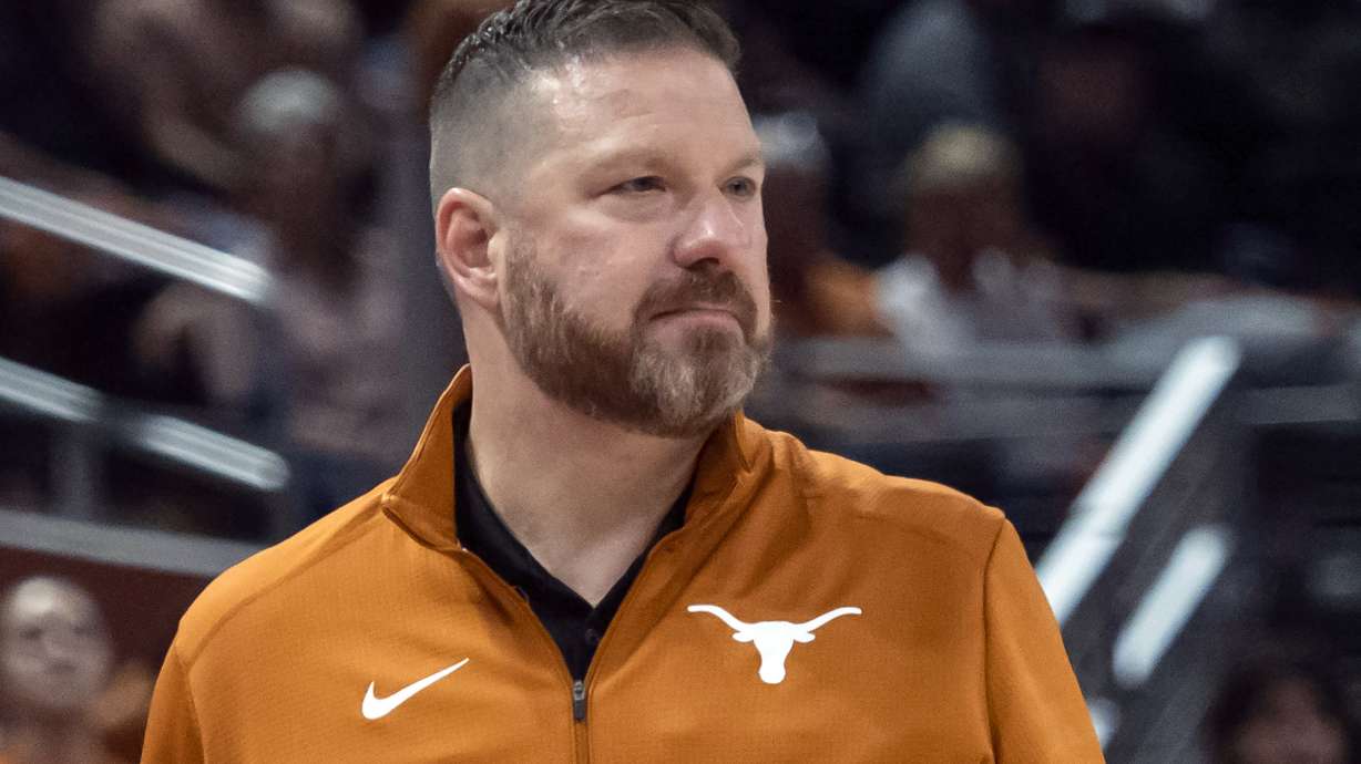 FILE - Texas head coach Chris Beard looks on during the first half an NCAA college basketball game against UTEP on Nov. 7, 2022, in Austin, Texas. Mississippi has hired Chris Beard as basketball coach five weeks after his firing from Texas following a domestic violence arrest. The Rebels announced Beard's hiring on Monday, March 13, 2023, and will introduce him Tuesday in a public event at the SBJ Pavilion.