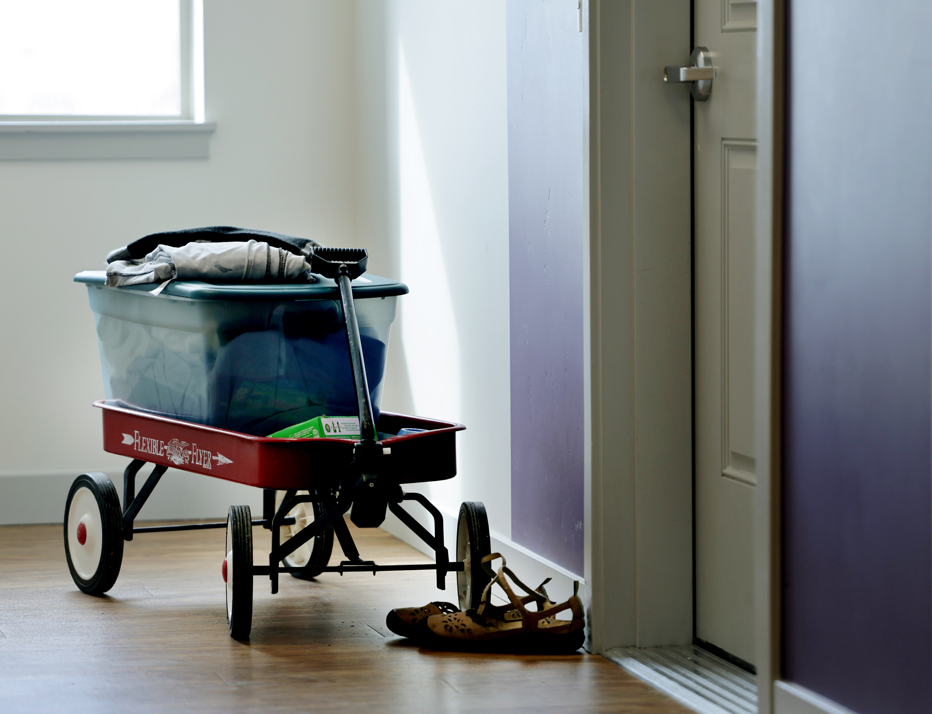 Personal items of a resident sit outside their door at the Central City Apartments. The rising numbers of homeless and the cost of housing indicate the need for more immediate intervention from the state, according to the new report on homelessness.