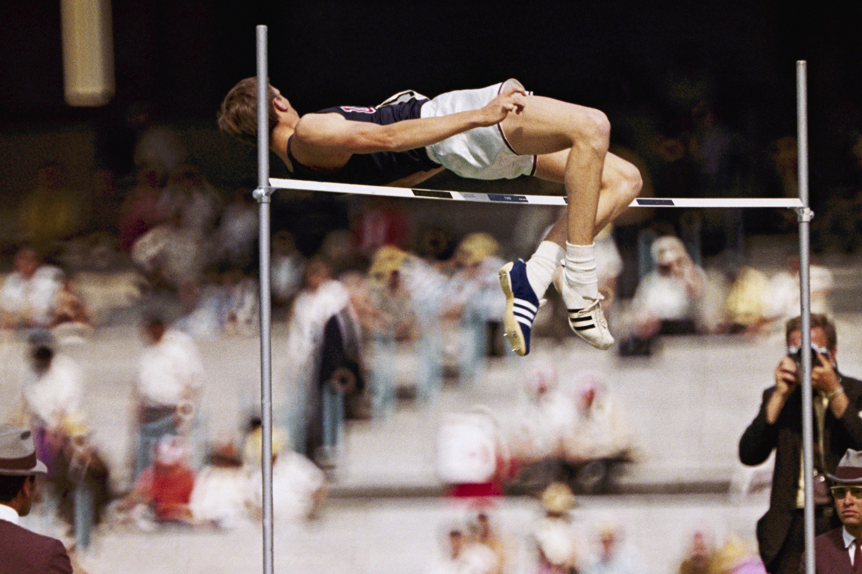 FILE - Dick Fosbury, of the United States, clears the bar in the high jump competition at the 1968 Mexico City Olympics. Fosbury, the lanky leaper who completely revamped the technical discipline of high jump and won an Olympic gold medal with his “Fosbury Flop,” has died after a recurrence with lymphoma. Fosbury died Sunday, March 12, 2023, according to his publicist, Ray Schulte. He was 76.
